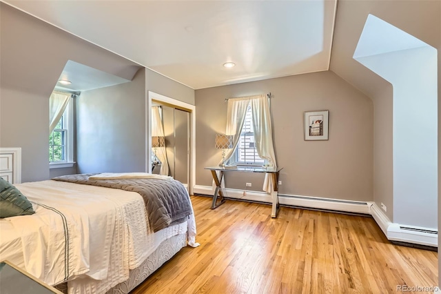 824 S Medea Way, Denver, CO 80209 - bedroom with a closet, light wood finished floors, recessed lighting, and lofted ceiling