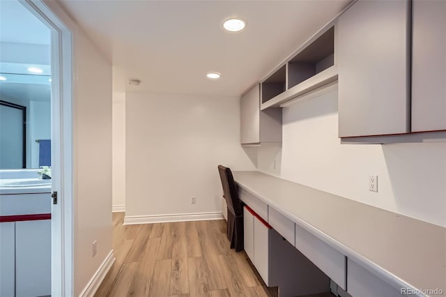 824 S Medea Way, Denver, CO 80209 - unfurnished office with light wood-type flooring, recessed lighting, and built in study area