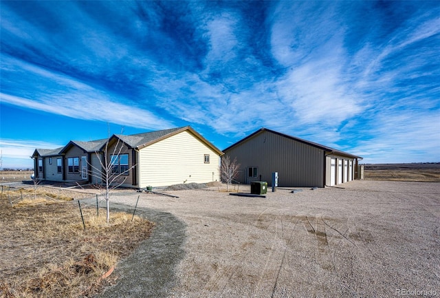 view of home's exterior with a garage