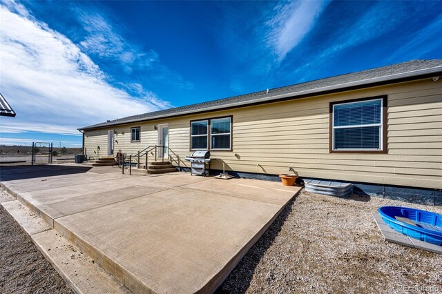 rear view of house featuring a patio area