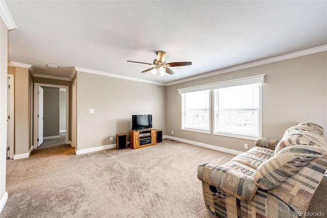 carpeted living room featuring crown molding and ceiling fan