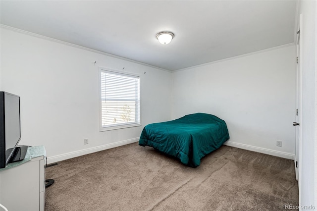 bedroom featuring ornamental molding and carpet