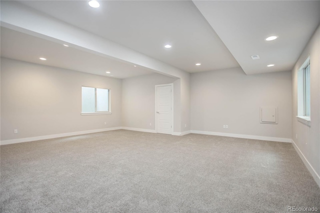 empty room with visible vents, carpet flooring, recessed lighting, and baseboards