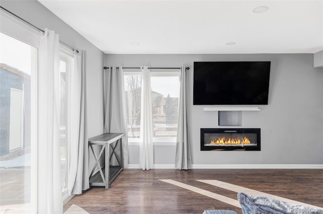 living room featuring dark wood-type flooring