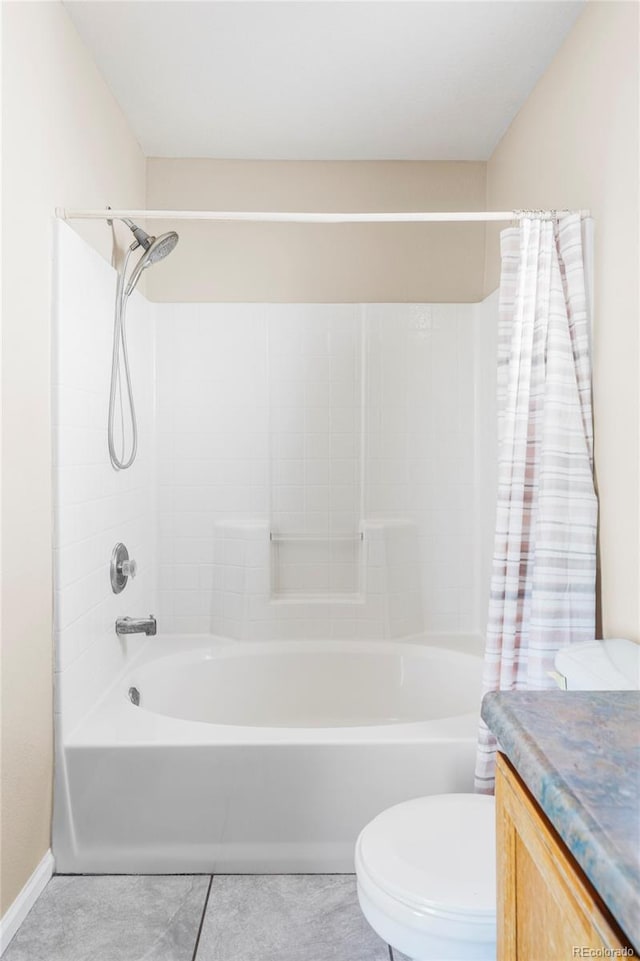 full bathroom featuring vanity, shower / bathtub combination with curtain, tile patterned floors, and toilet