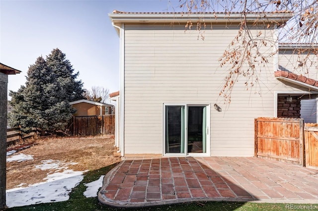 rear view of property with a patio area