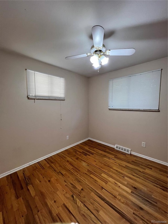 11812 E Alaska Ave, Aurora, CO 80012 - spare room with ceiling fan and wood finished floors