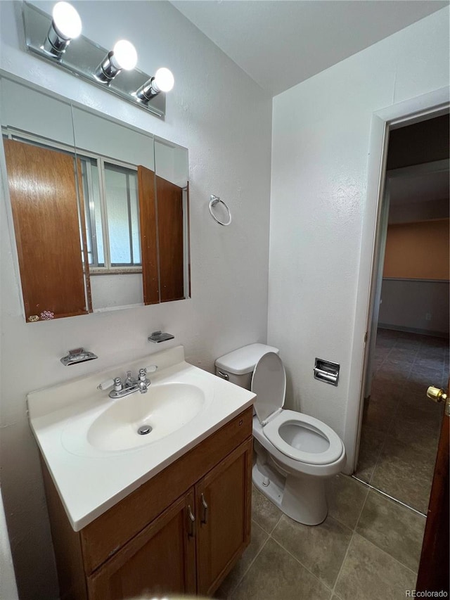 11812 E Alaska Ave, Aurora, CO 80012 - bathroom featuring vanity and tile patterned flooring