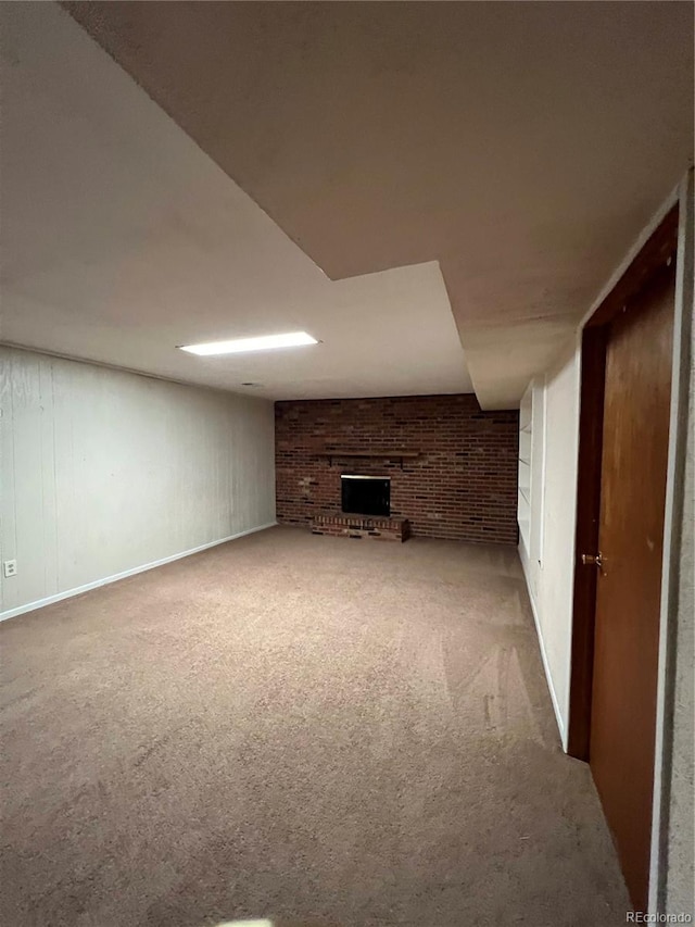 11812 E Alaska Ave, Aurora, CO 80012 - finished basement featuring carpet, a fireplace, and brick wall