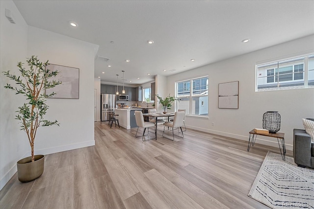 6106 W 28th Ct, Edgewater, CO 80214 - dining room with light wood-type flooring and recessed lighting