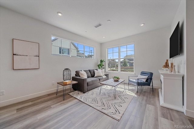 6106 W 28th Ct, Edgewater, CO 80214 - living room with light wood-style floors and recessed lighting
