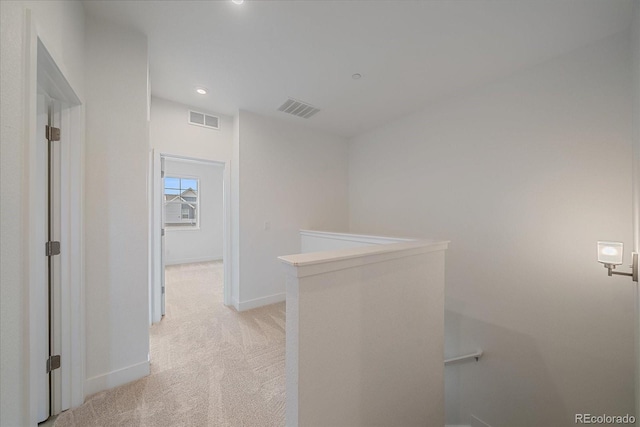 6106 W 28th Ct, Edgewater, CO 80214 - hallway featuring an upstairs landing, light carpet, and recessed lighting