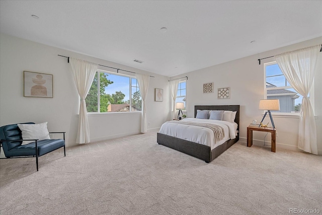 6106 W 28th Ct, Edgewater, CO 80214 - carpeted bedroom featuring multiple windows