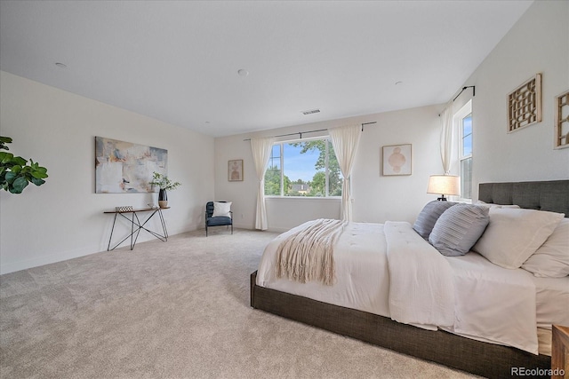 6106 W 28th Ct, Edgewater, CO 80214 - bedroom with multiple windows and carpet