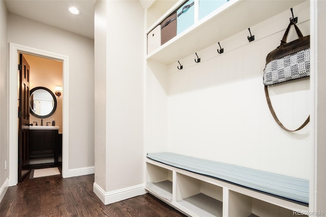 mudroom featuring baseboards, dark wood-style flooring, and recessed lighting