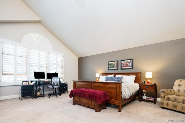 bedroom with high vaulted ceiling, carpet, and baseboards