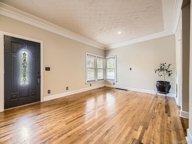 5339 S Windermere St, Littleton, CO 80120 - entrance foyer with light wood-type flooring, baseboards, and crown molding