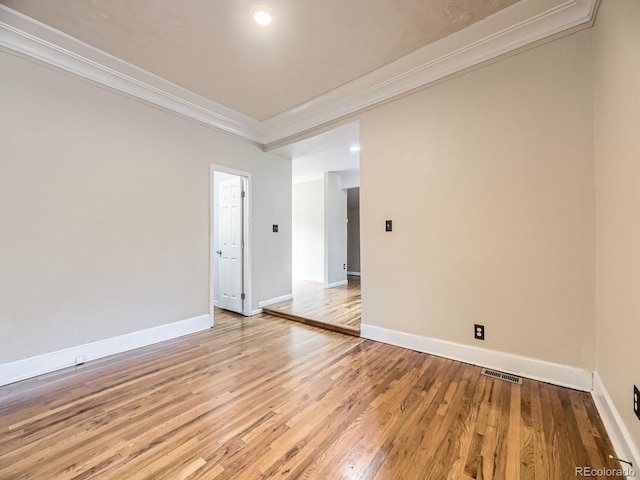 5339 S Windermere St, Littleton, CO 80120 - unfurnished room featuring crown molding, baseboards, and light wood finished floors