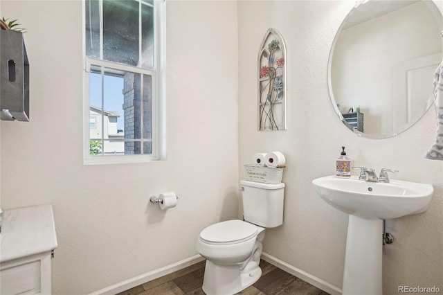 1846 Osprey Dr, Brighton, CO 80601 - half bath with toilet and baseboards