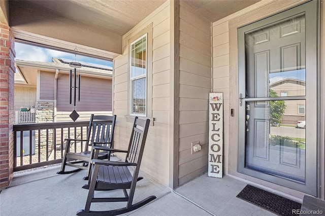 1846 Osprey Dr, Brighton, CO 80601 - doorway to property featuring a porch