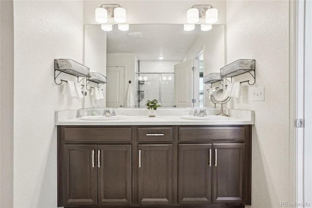 1846 Osprey Dr, Brighton, CO 80601 - full bathroom featuring a stall shower and double vanity