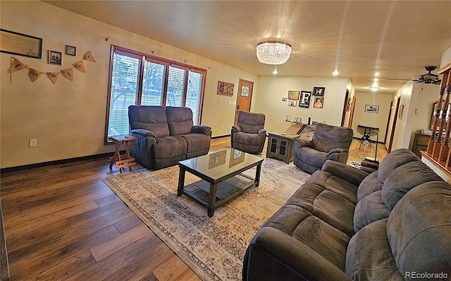 living room with baseboards and hardwood / wood-style floors