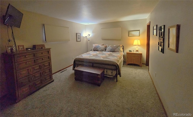 bedroom with light carpet