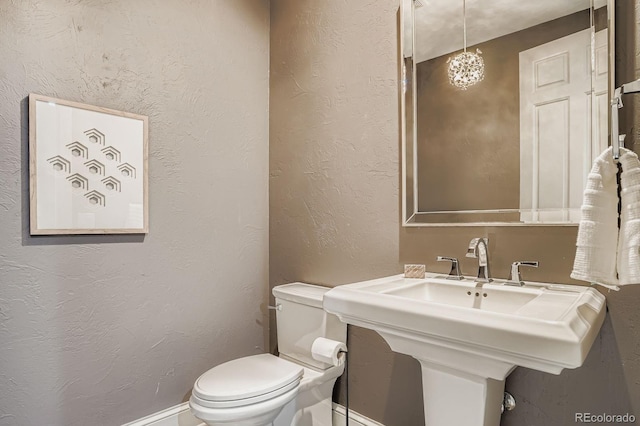 490 Columbine St Unit 5, Denver, CO 80206 - half bath with toilet and a textured wall