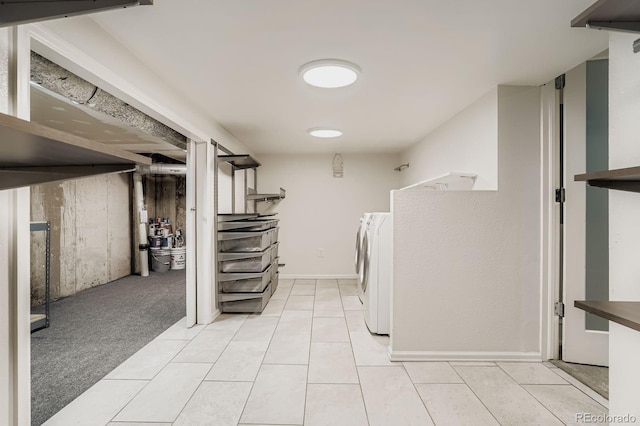490 Columbine St Unit 5, Denver, CO 80206 - laundry room with washing machine and clothes dryer and light tile patterned floors