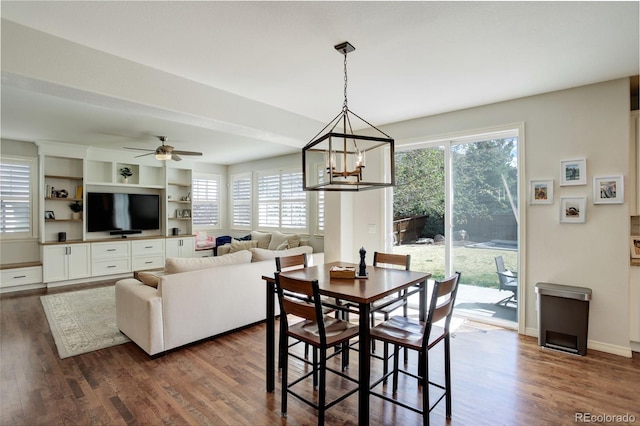 4542 Valleybrook Dr, Highlands Ranch, CO 80130 - dining room featuring plenty of natural light and dark wood finished floors