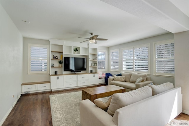 4542 Valleybrook Dr, Highlands Ranch, CO 80130 - living room with ceiling fan, dark wood-style floors, and baseboards