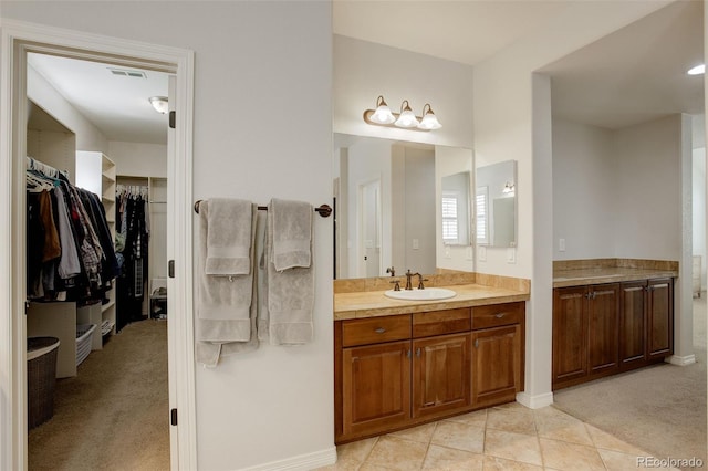4542 Valleybrook Dr, Highlands Ranch, CO 80130 - full bath featuring vanity and a walk in closet