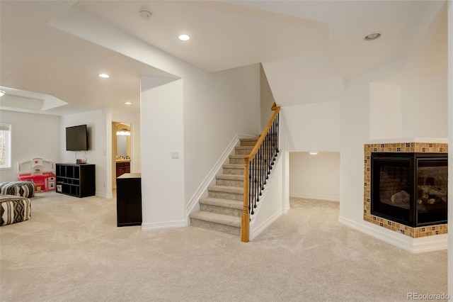 4542 Valleybrook Dr, Highlands Ranch, CO 80130 - living room featuring carpet, stairs, recessed lighting, a tile fireplace, and baseboards