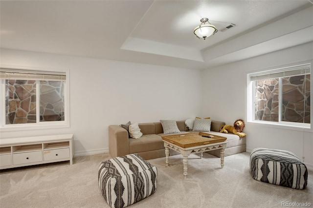 4542 Valleybrook Dr, Highlands Ranch, CO 80130 - living room featuring carpet flooring, a raised ceiling, and baseboards