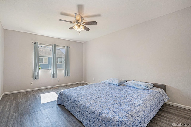 18954 E 57th Pl Unit D, Denver, CO 80249 - bedroom featuring wood finished floors and ceiling fan