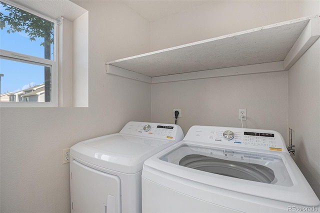 18954 E 57th Pl Unit D, Denver, CO 80249 - washroom featuring washing machine and dryer