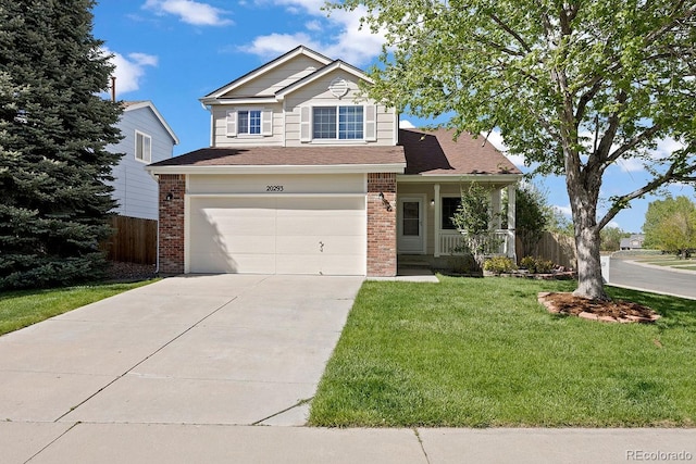 view of front facade featuring brick siding, a garage, concrete driveway, and a porch