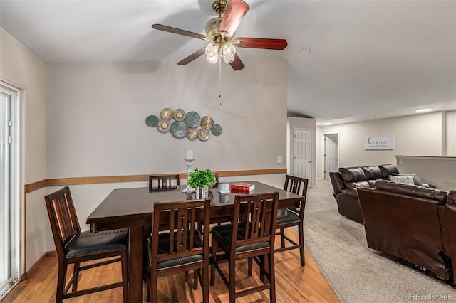 dining room featuring ceiling fan and hardwood / wood-style floors