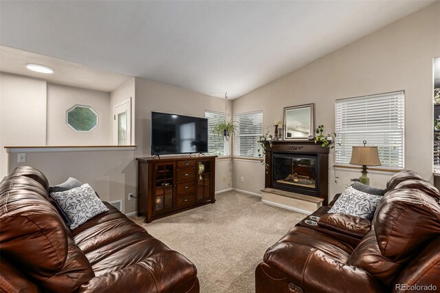 living room with light carpet and vaulted ceiling