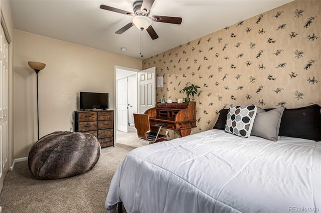 bedroom with ceiling fan and carpet