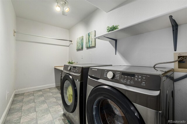 washroom featuring separate washer and dryer