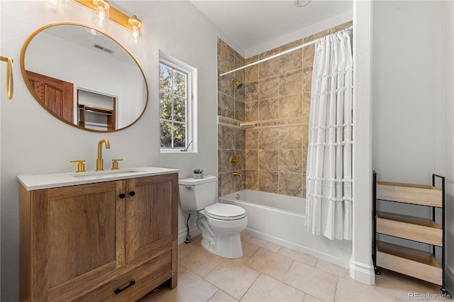 full bathroom with tile patterned floors, toilet, vanity, and shower / bathtub combination with curtain