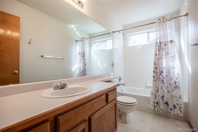 full bathroom with vanity, toilet, and shower / tub combo with curtain