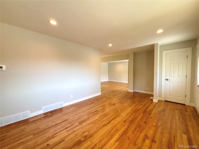 8239 Nola Dr, Denver, CO 80221 - unfurnished room with light wood-type flooring and recessed lighting