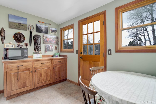 dining room with baseboards