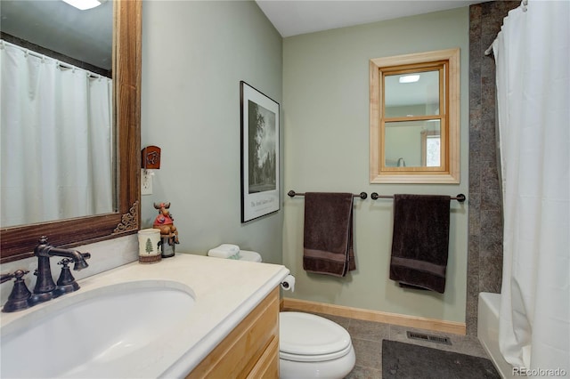 full bath featuring toilet, tile patterned floors, visible vents, baseboards, and vanity