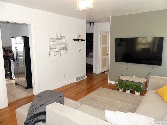 living room featuring wood-type flooring