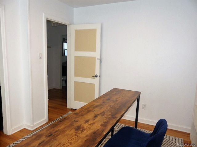 office area with light hardwood / wood-style flooring