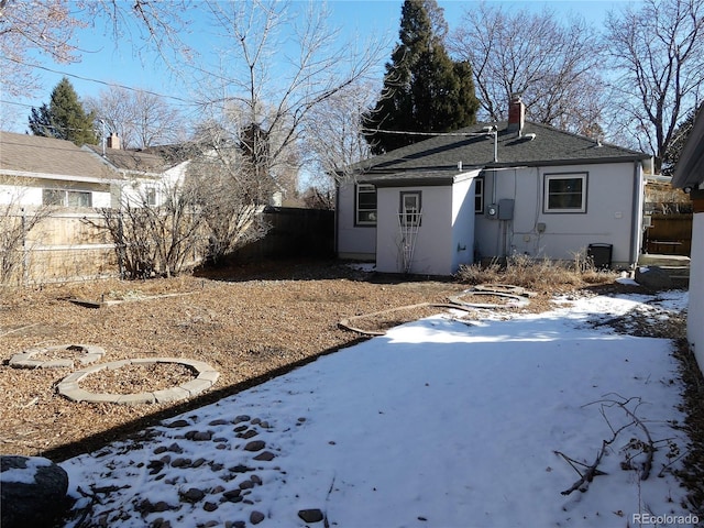 view of snow covered property