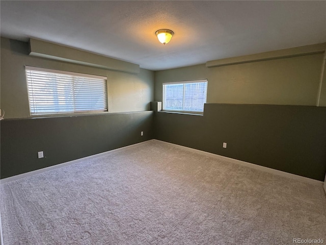 spare room with carpet flooring